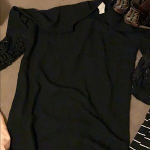 women’s cute black dress with details on sleeves